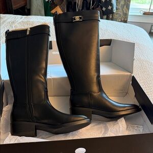 Tommy Hilfiger Black Leather to the knee Riding Boots. 1 1/2” heel. Never worn